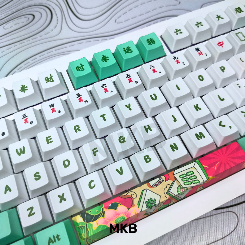 Mahjong Artisan Keycap on a backlit keyboard, displaying its compatibility with RGB lighting effects.