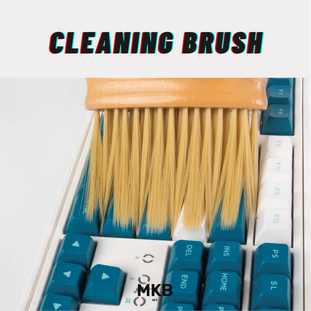 Angled view of MKB Keyboard Cleaning Brush highlighting ergonomic design and durable bristles