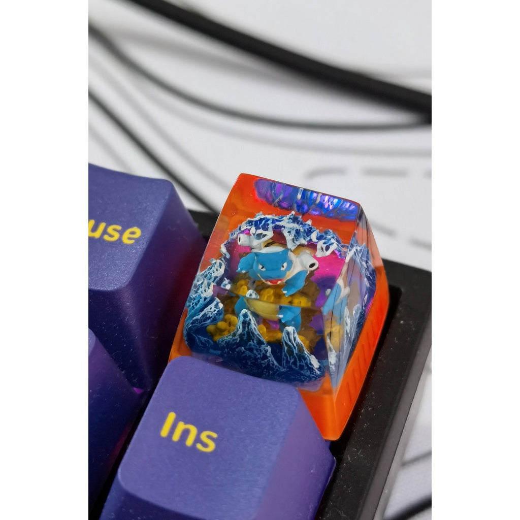 Pokemon Blastoise artisan keycap on a RGB keyboard