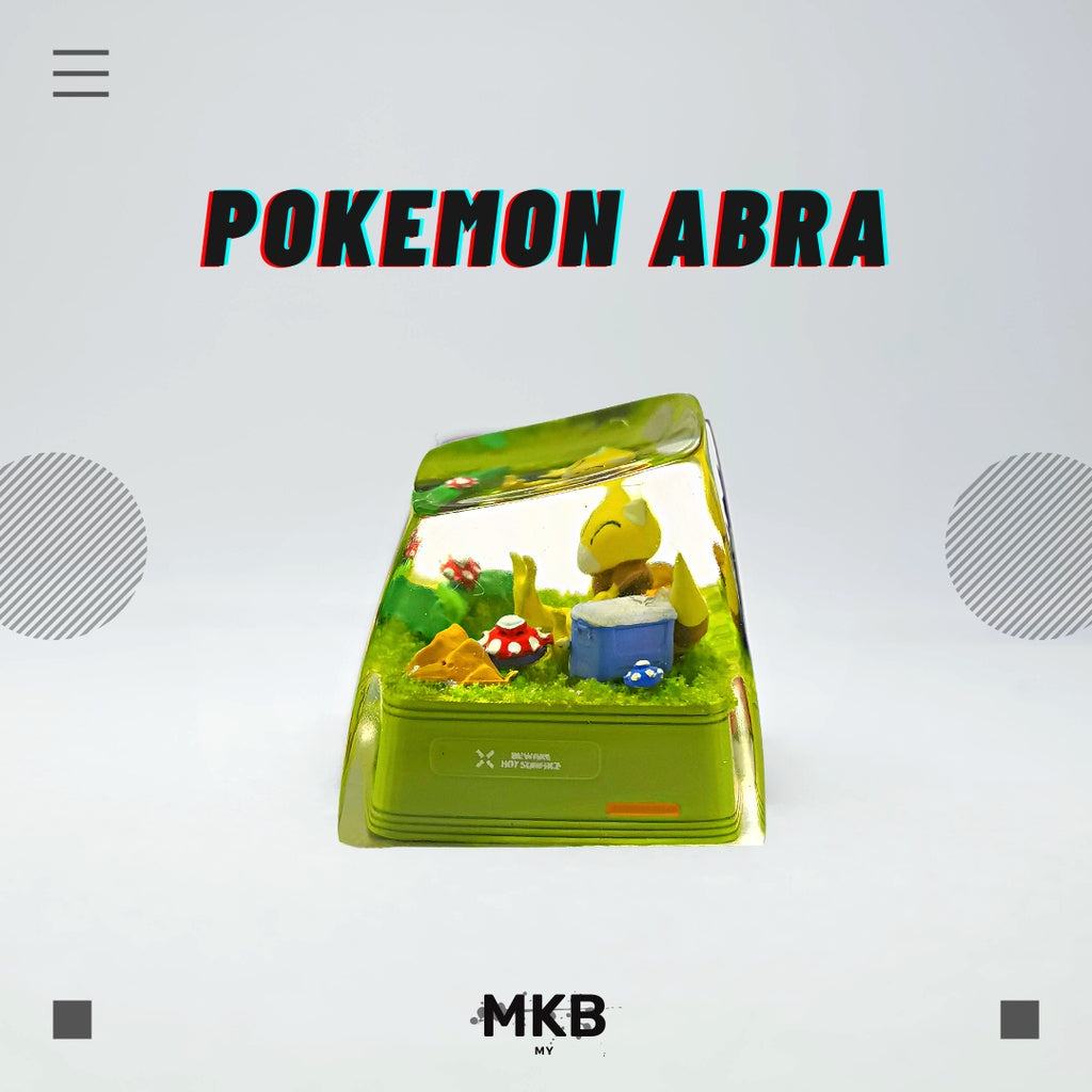 Side view of Pokemon Abra artisan keycap